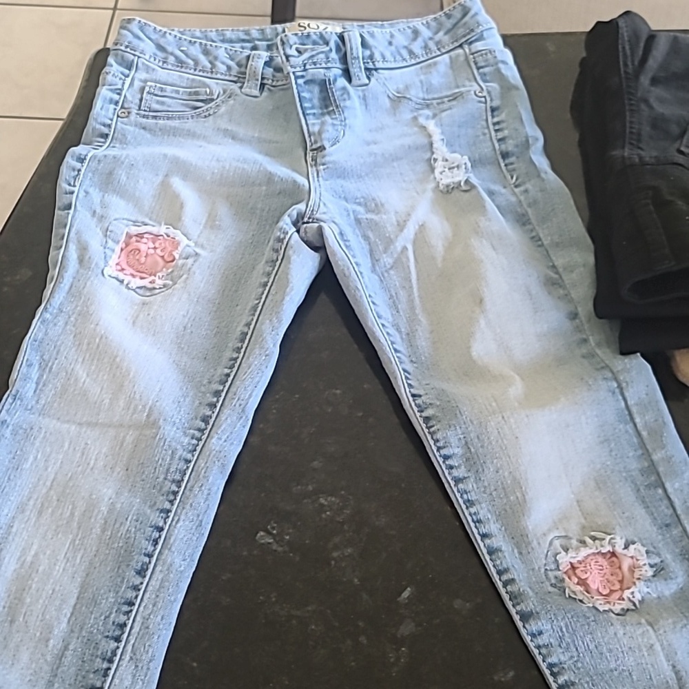Cute blue skinny jeans with lace patches